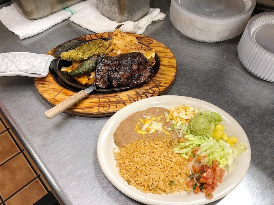 Printed menu with homestyle dishes listed.